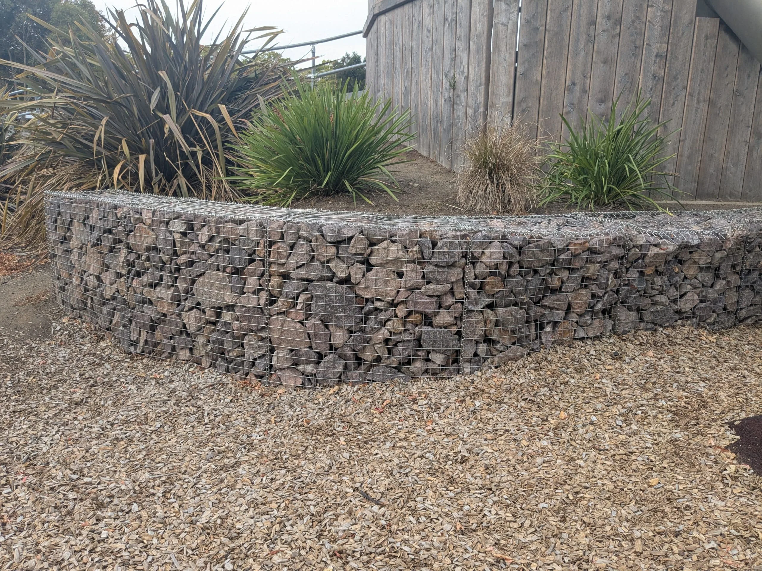 Gabion retaining wall made of stone-filled wire baskets in Moreton Bay
