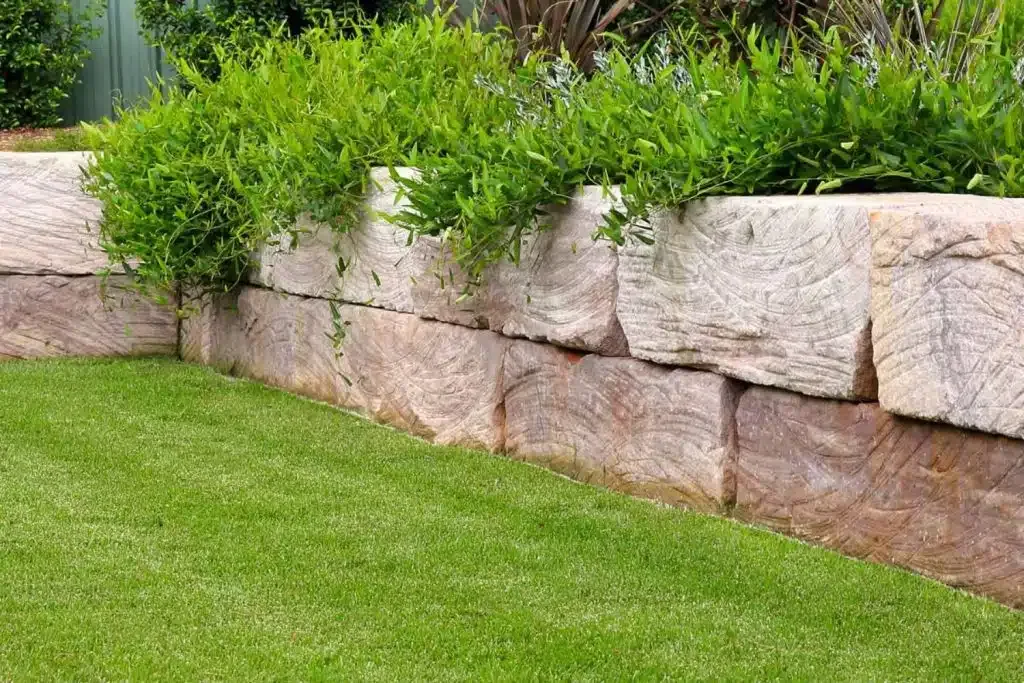 Sandstone retaining wall on a residential property in Moreton Bay